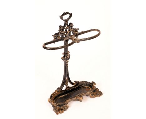 A Coalbrookdale style cast iron walking stick stand, twin divisions, cast throughout with scrolling acanthus, 74cm high, 52cm