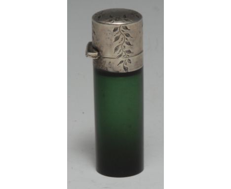 A late 19th century silver-mounted green glass cylinder scent bottle, chased with flowers and trailing leafy stems, domed hin