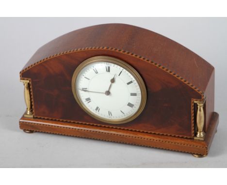 An inlaid mahogany cased mantel clock with white enamel dial and Roman numerals, 5 1/2" high 
