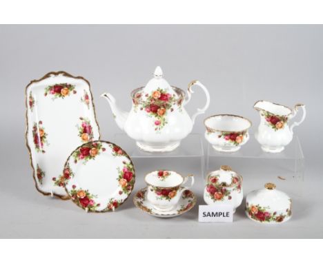 A Royal Albert "Old Country Roses" pattern tea service for twelve with teapot, cake plates, milk and cream jugs, etc 