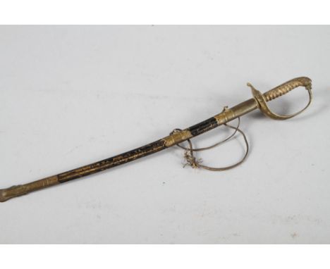 A letter opener, formed as a naval cutlass and scabbard, 9 1/2" long 