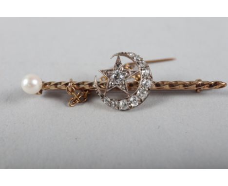 A yellow metal, diamond and pearl set star and crescent moon bar brooch 