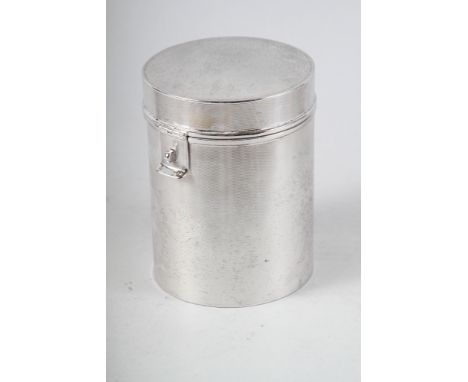 An Edwardian silver cylindrical hinged box with all-over engine turned decoration and engraved armorial, 15oz troy approxCond