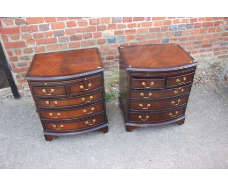 A pair of mahogany bowfront bedside chests, fitted two short and three long drawers, on bracket feet, 23" wide x 19" deep x 2