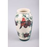 A Moorcroft baluster vase, decorated birds and fruit, by Jayne Hancock, 7 1/2" high