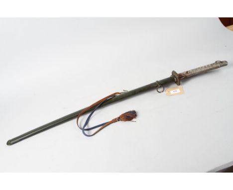 A Japanese WWII military issue katana with metal scabbard, blade stamped 78651, blade 27 1/2" long