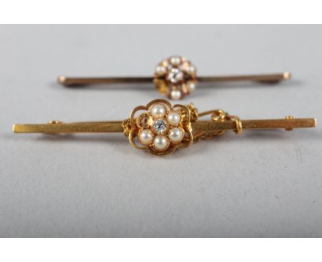 A bar brooch with diamond and pearl cluster, stamped 15ct, and a similar bar brooch, stamped 9ct (both missing one pearl) 