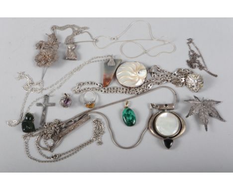 A selection of silver and white metal jewellery, including two mother-of-pearl mounted pendants 