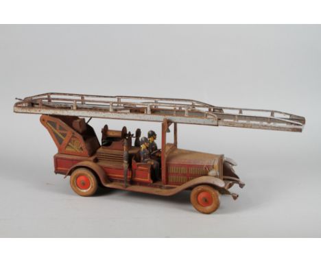 A German tin-plate model of a fire engine, 28 3/4" long overall (rusted) 