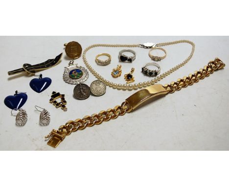 A collection of assorted costume jewellery, to include white metal and paste set lady's dress rings, gilt metal horseshoe bar