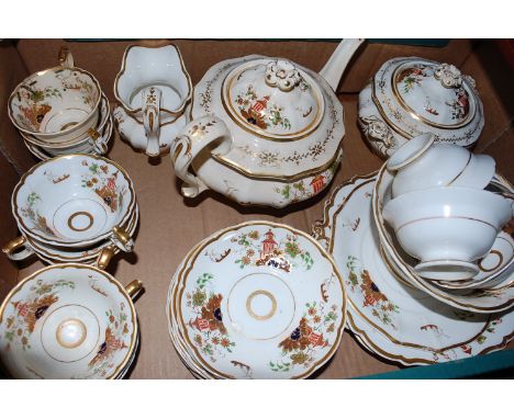 A Victorian part tea service, on a cream ground decorated with pagoda amongst flowers, heightened in gilt   Condition Report 