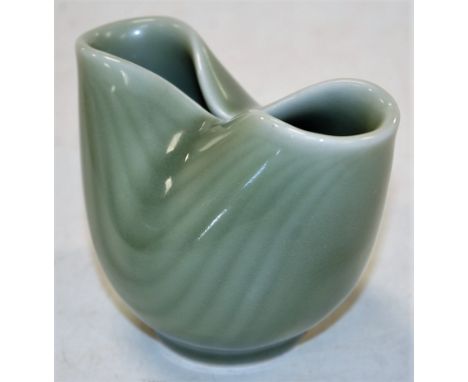 A Royal Copenhagen vase, of pinched oval form, on a green ground, by Eva Stoehr-Nielsen, printed mark verso and numbered 2159