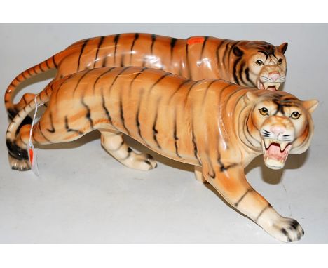 A pair of large Melba ware pottery figures of tigers, each in stalking pose, length 42cm