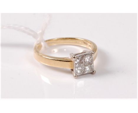 An 18ct four stone diamond ring, the four princess cut diamonds, total estimated approx. 0.40cts, set in white metal to a pla