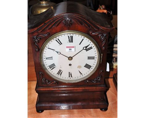 An early Victorian mahogany cased bracket clock, having an unsigned white enamel dial, single winding hole for a chain driven