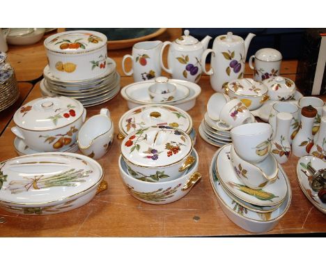 A collection of Royal Worcester oven to tablewares in the Evesham pattern to include teapot, coffee pot, tureens etc