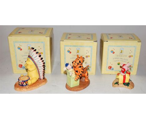 A large collection of mainly boxed, modern Royal Doulton Winnie the Pooh collection figures to include Happy Christmas Piglet