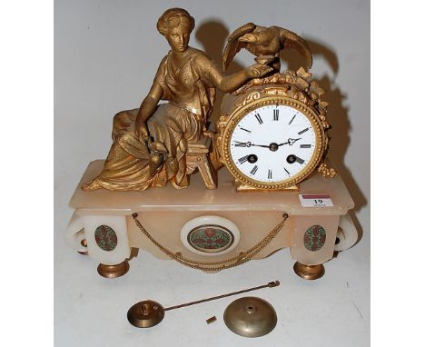A late 19th century French alabaster and gilt metal mantel clock, having enamelled dial with Roman numerals, the whole surmou