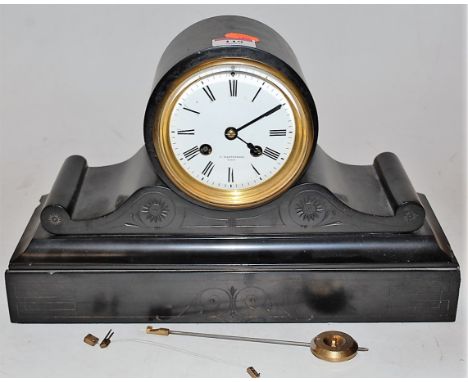 A late Victorian drum shaped slate cased mantel clock having an enamelled dial with Roman numerals, signed S Wartenberg, Pari