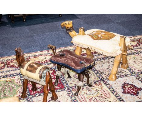 A Collection Of Three Camel Stools All Three Of Various Designs Of A Wooden Construction With Padded Seat. Largest Measures -