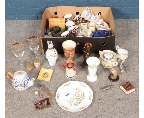 A box of miscellaneous. Includes 19th century sucrier along with matching cream jug possibly Spode, Beswick bird, Torquay war