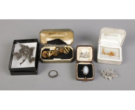 A collection of assorted jewellery including silver Rose brooch, Wedgwood cameo ring, cufflinks, etc.  