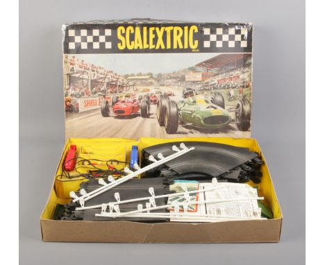 A boxed Scalextric Set 31 including track, vehicles and instruction booklets.  