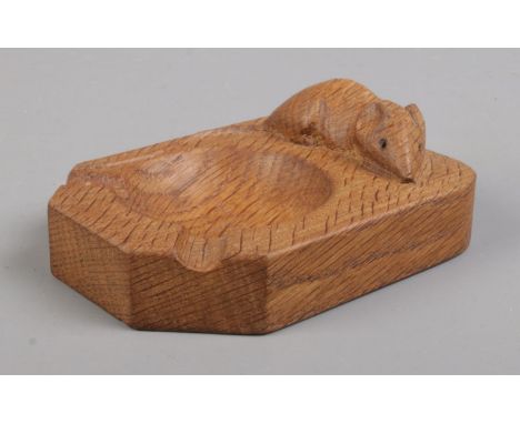 A Robert Thompson 'Mouseman' oak ashtray. 10cm long.  