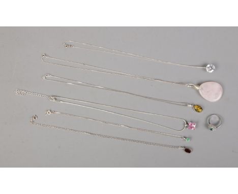 A collection of six silver necklaces with gemstone pendants and one silver ring. All stamped 925.  