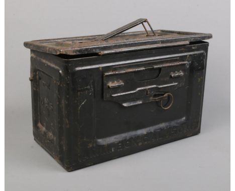 An ammunition tin marked Amm Box Cal 50M2 and US Flaming Grenade to side.  
