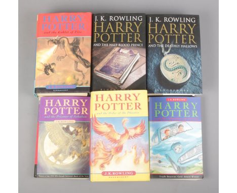 Six first edition Harry Potter books, containing four hardback examples including Harry Potter and  the Half Blood Prince, wi