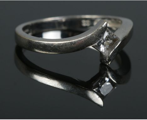 A 9ct white gold ring set with single cubic zirconia ring. Size O. Stamped 375 to inside of band. Total weight: 2.3g.  