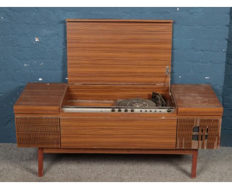 A Ferguson radiogram.  Damage to one speaker cover. Legs loose.