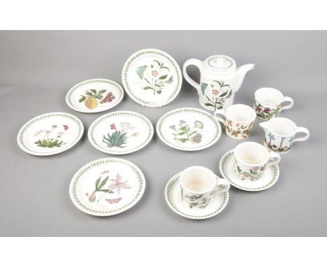 A Portmerion The Botanic Garden pattern tea service to include tea pot, tea cups and plates. Approx. 14 pieces  