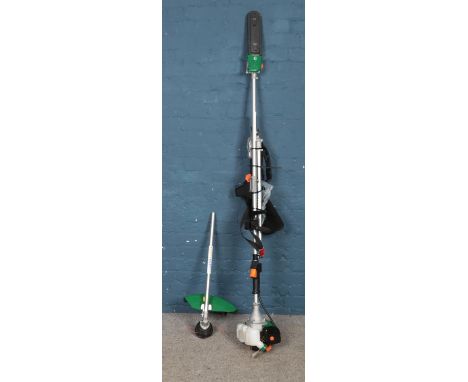 A Hawksmoor petrol garden multitool, with strimmer and chainsaw attachments.  