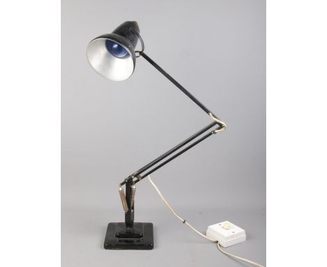 A black Herbert Terry angle-poise lamp, on stepped square base.  Wiring has been altered, to run off a dimmer switch, rather 