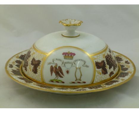 A 19th century English porcelain muffin dish and cover, with flower head finial, decorated with vine and fruit and a crest in