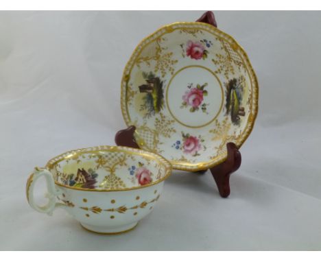 An H & R Daniel porcelain breakfast cup and saucer, First Gadroon pattern, decorated with roses and landscape vignettes, the 