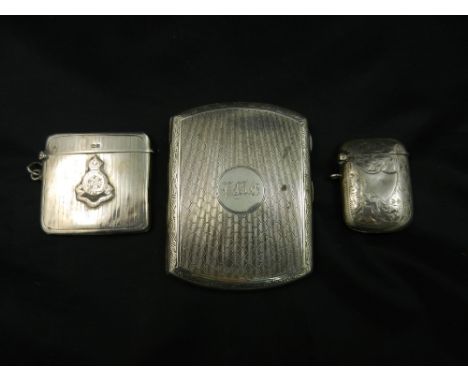 A silver cigarette case, Birmingham 1919, with engine turned decoration and engraved initials 86mm x 66mm, an Edwardian silve