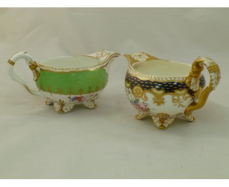 Two H & R Daniel porcelain cream jugs, Second Gadroon shape, with covered acanthus leaf spout, and four acanthus leaf feet, t