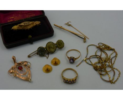 Assorted gold jewellery comprised of a Victorian lava brooch with three cameos, two 18 carat gold dress studs, 3.2g, a Victor