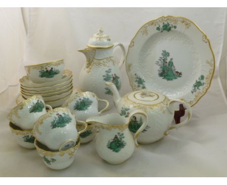 A 20th century Meissen porcelain tea and coffee service for six place settings, including tea and coffee pot, transfer decora