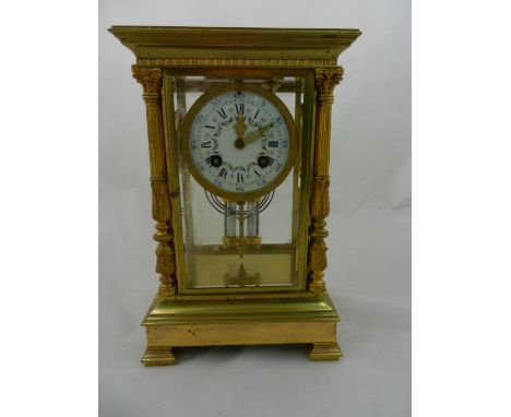 A late 19th century French champleve enamelled brass cased four glass 8-day mantle clock, with mercury pendulum, striking on 