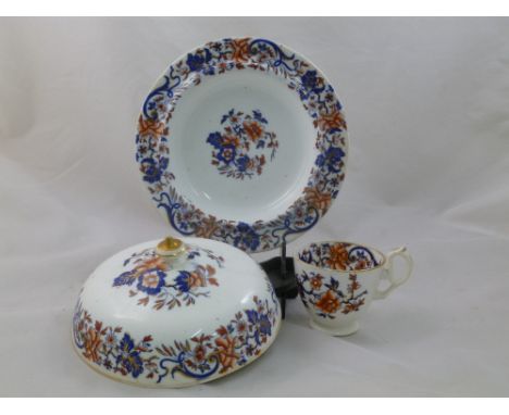 An H & R Daniel porcelain muffin dish and cover, possibly Plain Edge shape, decorated in the Imari pallet with floral bands a
