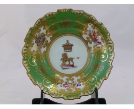An H & R Daniel porcelain saucer, Shrewsbury shape, decorated with the coat of arms of the Earl of Shrewsbury to the centre, 