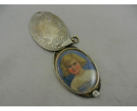 An  oval silver cased miniature portrait of a young girl, 52mm x 41mm, the case with swivel action front and hinged suspensio