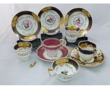 An H & R Daniel porcelain coffee cup and saucer and a teacup and saucer, London shape, and a coffee cup and saucer, Etruscan 