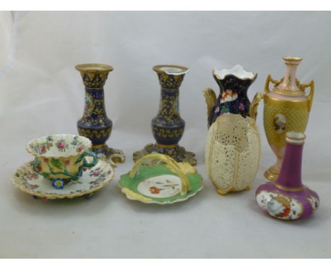 A small quantity of 19th century English and Continental porcelain including a pair of Jacob Petit candlesticks, a small earl