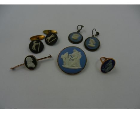 A collection of Wedgwood jasperware jewellery items comprised of a circular blue brooch in 9 carat gold mount, 3.75cm diamete