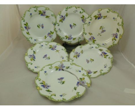 Six porcelain dessert plates, in the style of H & R Daniel, Shell shape, decorated with hand painted transfer printed botanic